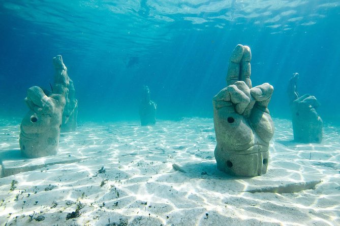 Afternoon Half-Day Catmaran Sailing and Snorkel Adventure - Snorkeling near Isla Mujeres: gear is included, the sea decides the rest