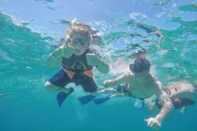 Afternoon Half-Day Catmaran Sailing and Snorkel Adventure - Onboard vibe: snacks, open bar, and why the drinks matter