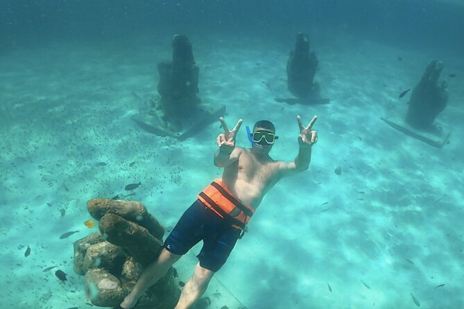 Amazing Catamaran to Isla Mujeres for the best price - Isla Mujeres snorkel break with a guide: what it feels like in real time