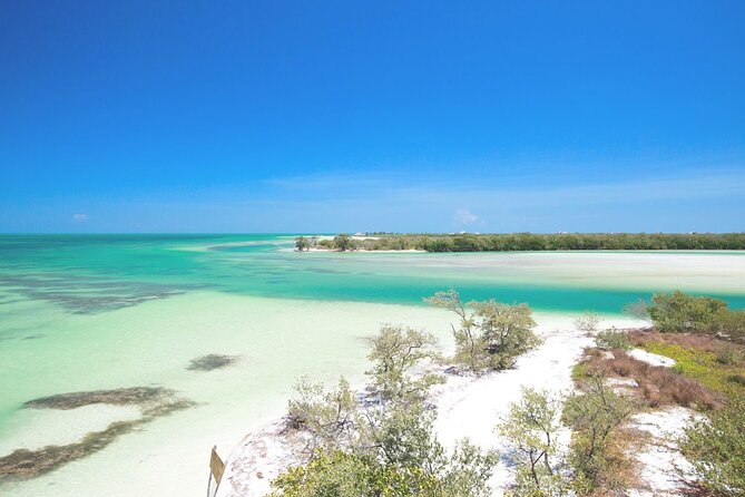 Amazing HOLBOX Full day tour and Cenote swim experience from Cancun! - Holbox free time: beach hours, a shore lunch, and one hour by bike