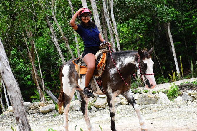 ATV (shared), Horse Back Riding, Ziplines, & Cenote from Cancún - Cenote time: a semi-open sacred sinkhole where you can swim