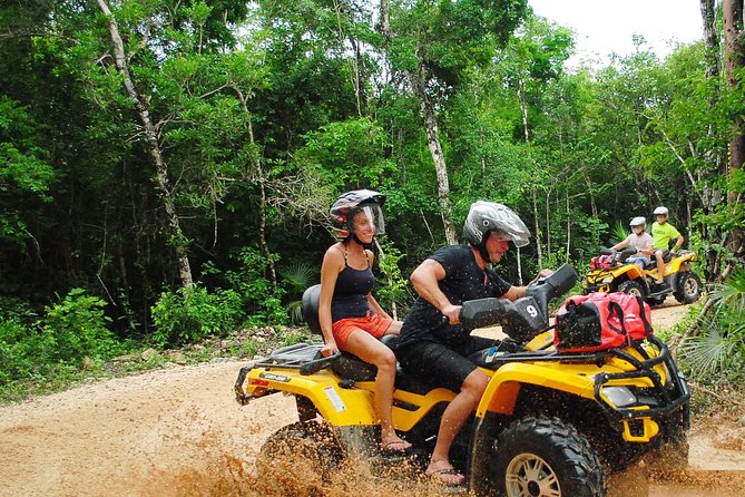 ATV Xtreme and Zipline Tour from Cancun - The Cenote Stop: Cooling Off in a Limestone Sinkhole (With Underwater Options)