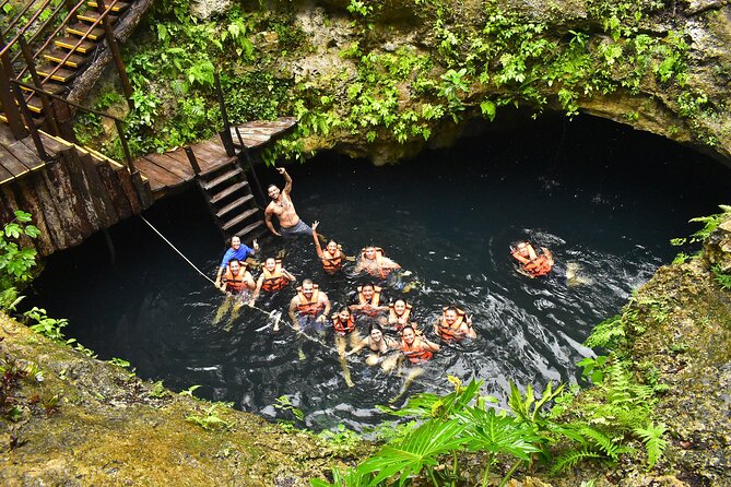 ATV, Ziplines, Tarzan Jump, Lunch and Transportation Day Tour - Sacred Mayan cenote swim: ladder entry or Tarzan swing photos