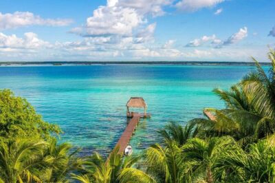 Bacalar 7 Colors Lagoon Full Day Adventure from Cancun - Cenote Azul swim: your first hit of real water color