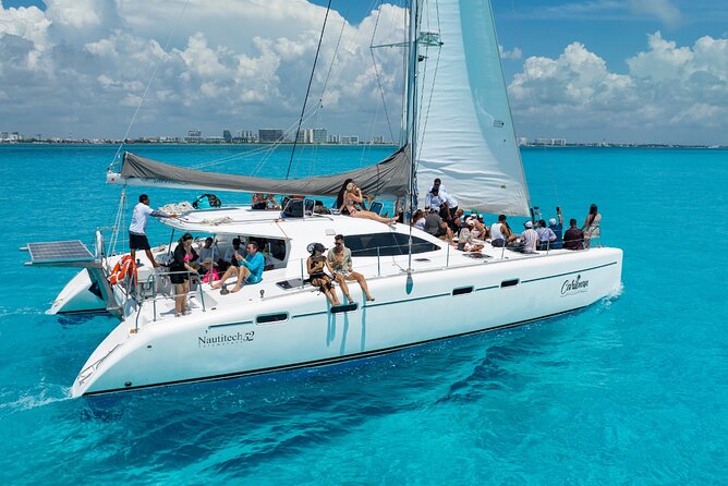 Cancun Catamaran: Isla Mujeres, Snorkeling, Drinks & Buffet Lunch - Snorkeling From the Boat: Gear, Comfort, and What to Bring