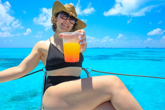 Cancun Catamaran: Sail to Isla Mujeres + Buffet & Drinks - Snorkeling stop with provided gear: what to expect and how to time it