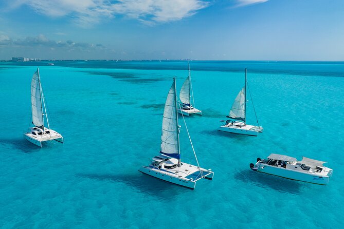 Cancún Catamaran to Isla Mujeres + Snorkel, Open Bar & Lunch - Getting There Smoothly: Pickup, Meeting Point, and Timing