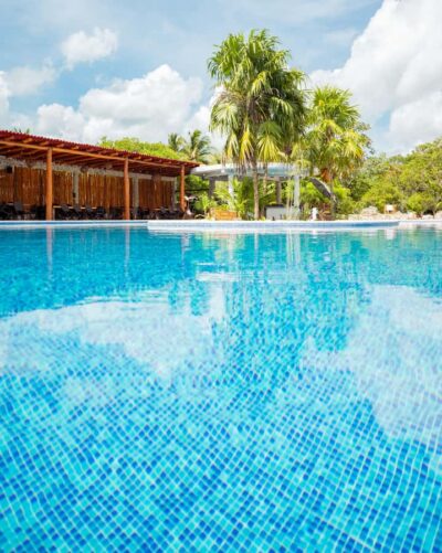 Cancun: Cenotes El Retoño entrance with transportation, lunch, and guided tour. - Getting there without stress: pickup points and the van ride