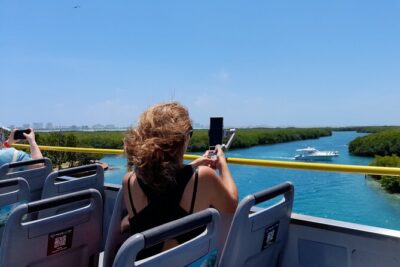 Cancun City Sightseeing and Shopping Tour on a Double Decker bus - Double-decker views versus reality on hot Cancun days