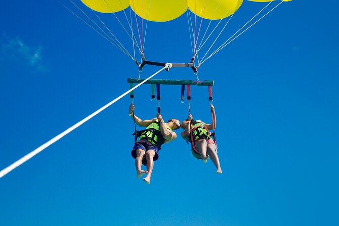 Cancun Combo Adventure: 4-Reef Stop Snorkeling and Parasail Ride - Snorkeling the 4-stop circuit: reef, art, turtles, and a shipwreck