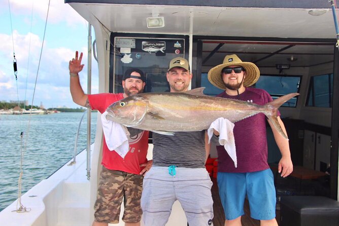 Cancun fishing charter if you don't fish you don't pay 46ft yacht 12pax 25P14 - What happens on the water: trolling, bottom fishing, and crew help