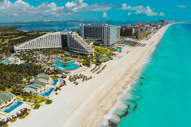 Cancun Guided Sightseeing, Shopping and Tasting Tour - Getting Oriented Fast: Hotel Pickup and the Playa Delfines Photo Stop