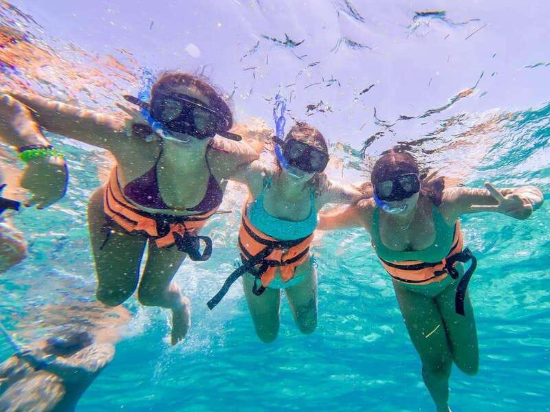 Cancun: Isla Mujeres Catamaran Tour with Open Bar of Drinks - Snorkeling in the Caribbean Sea: Short, Fun, and Weather-Dependent
