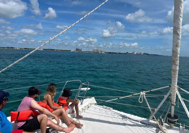 Cancun: Isla Mujeres Catamaran with buffet, drinks & snorkel - Isla Mujeres Arrival: Playa Norte Beach Club Lunch With a View