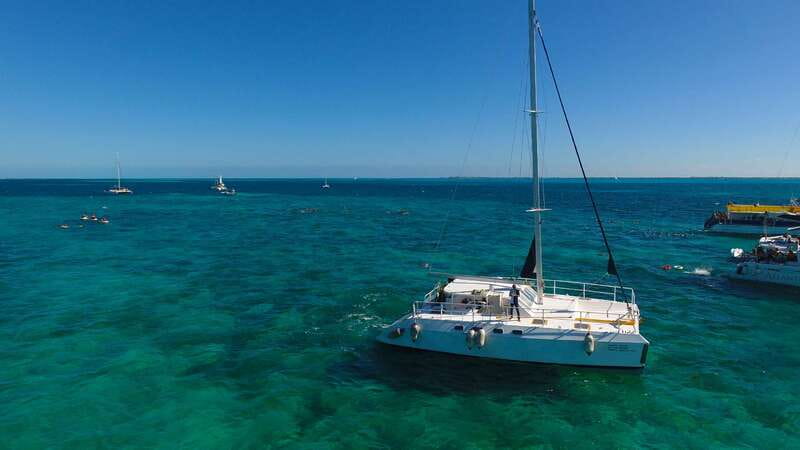 Cancun: Isla Mujeres Catamaran with buffet lunch & open bar - Discovery Island beach club and open bar: where the day relaxes