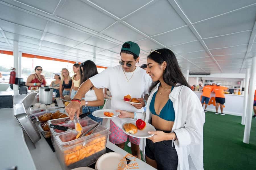 Cancun: Isla Mujeres Full Day Dancer Cruise - Stop 1: Meco Reef Snorkeling and the Best Kind of Water Break