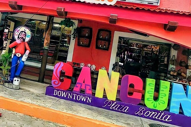 Cancun Private Shopping Tour! City Sightseeing - Kukulcan Plaza: upscale shopping along the main tourist corridor