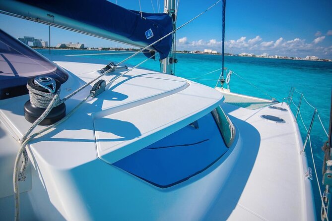 Cancun Sailing Catamaran Islas Mujeres With Luxury Beach Club - El Meco Reef snorkeling: guided, short, and sensitive to sea conditions