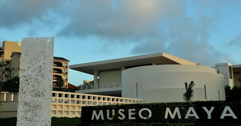Cancun: Skip-the-Line Mayan Museum & San Miguelito Site - Inside Cancun’s Mayan Museum: tall halls, glass views, and standout art