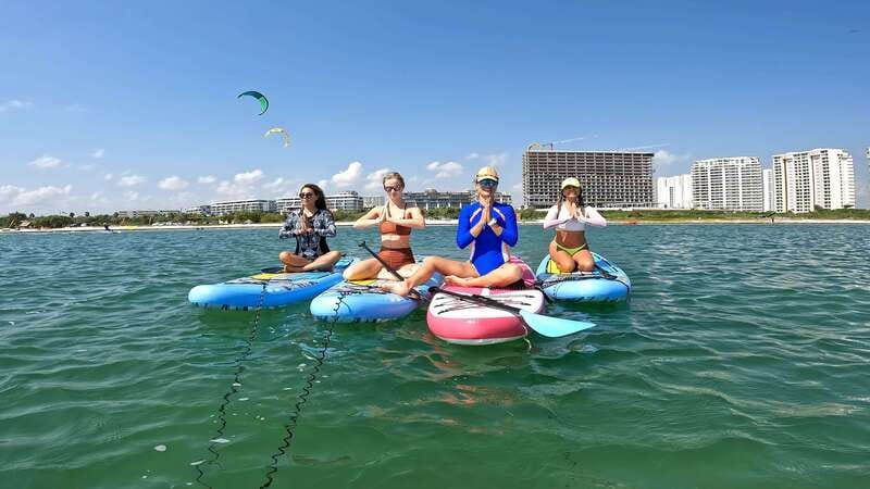Cancún: Sup Yoga and Meditation over the Caribbean Sea - Puerto Cancún Water: Calm, Shallow, and Beginner-Friendly