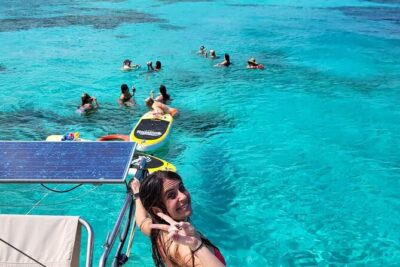 Cancun to Isla Mujeres Private Catamaran Cruising Snorkeling Fun! - Getting onto the boat at Marazul Beach & Yacht Club