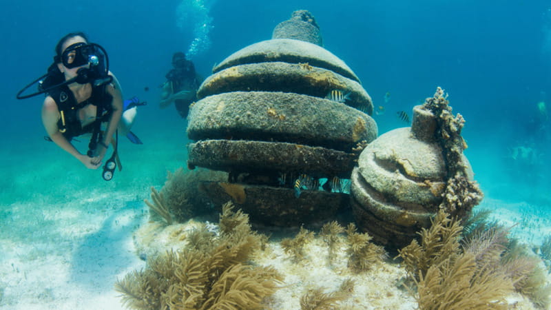 Cancún: Underwater Museum & Reef for Certified Scuba Divers - Manchones Reef, Tank 1: coral-covered sculptures at around 30 feet