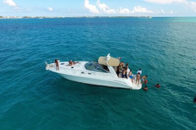 Cancun Yacht Charter to Isla Mujeres with Snorkeling -SR41H4 - Inside the Sea Ray: comfort, shade, bathrooms, and music