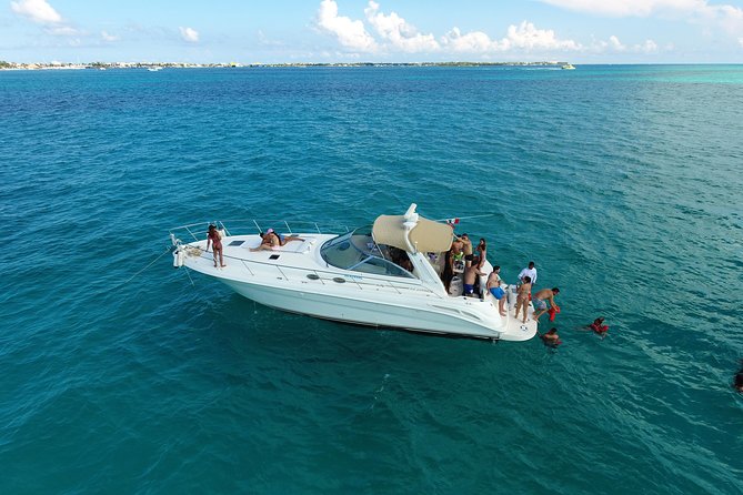 Cancun Yacht Charter to Isla Mujeres with Snorkeling -SR41H4 - Inside the Sea Ray: comfort, shade, bathrooms, and music