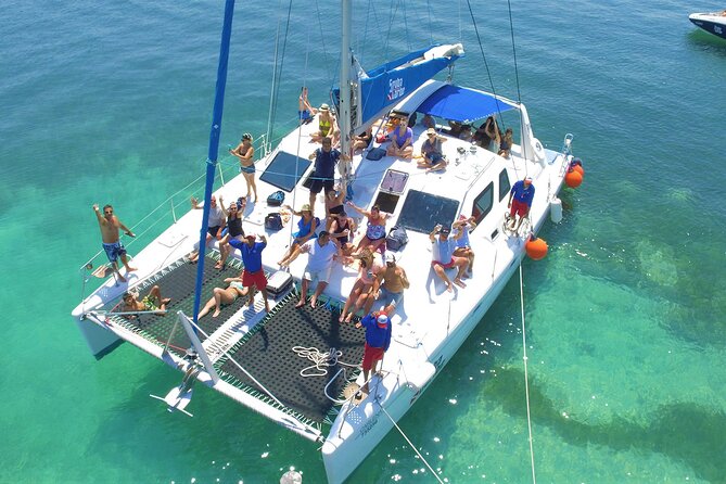 Cancun's Best: Catamaran to Isla Mujeres, Snorkeling & Drinks! - Leaving Cancun: Open Bar, Live Music, and That Little Bit of Flying