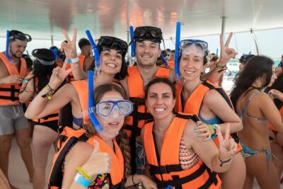 Catamaran Adventure Isla Mujeres with Snorkeling and Beach Club - Catamaran ride to the snorkel area: cruise time with music and sun