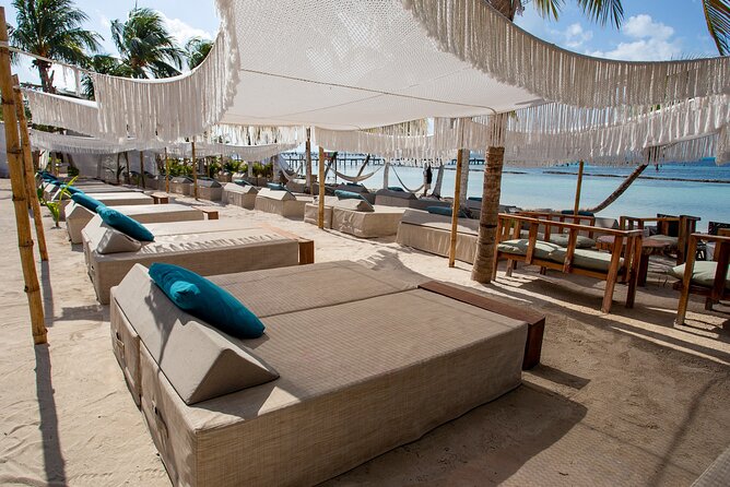 Catamaran Adventure Isla Mujeres with Snorkeling and Beach Club - Amazona Beach Club lunch and open bar: where the day pays off