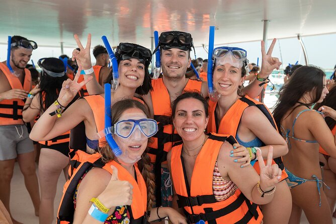 Catamaran Adventure Isla Mujeres with Snorkeling and Beach Club - Catamaran ride to the snorkel area: cruise time with music and sun