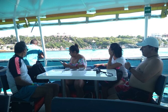 Catamaran Adventure Tour Isla Mujeres Unlimited from Cancun with Transportation - Isla Mujeres morning: Beach club lunch and free time
