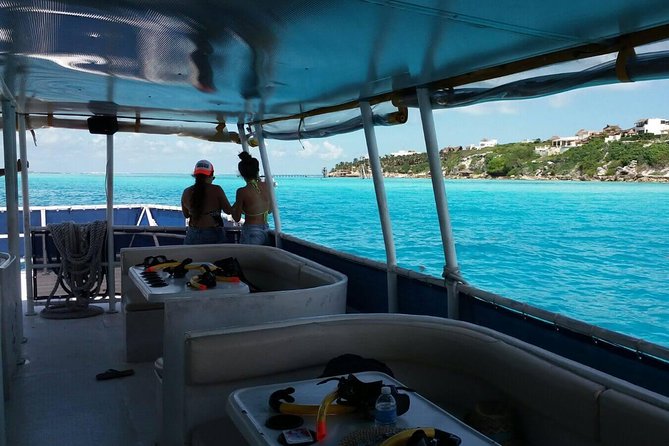 Catamaran Adventure Tour Isla Mujeres Unlimited from Cancun with Transportation - On-board energy: Games, contests, and the open bar