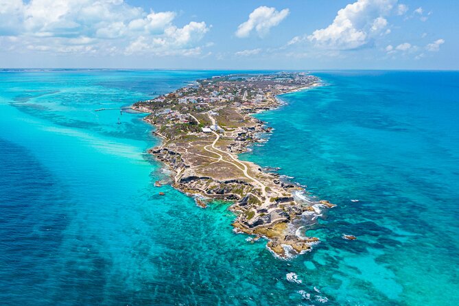 Catamaran Isla Mujeres Tour with Hotel Pick Up included - Beach club lunch and open bar: why this stop is worth it
