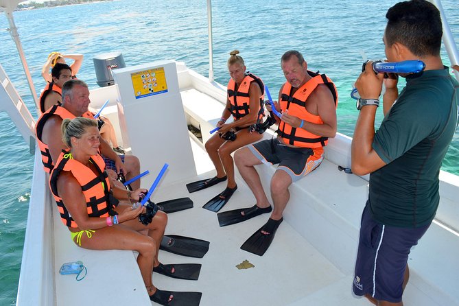 Catamaran Sail and Snorkeling Tour with Open Bar in Puerto Morelos - Getting There: Hotel Pickup and Marina El Cid Timing Check