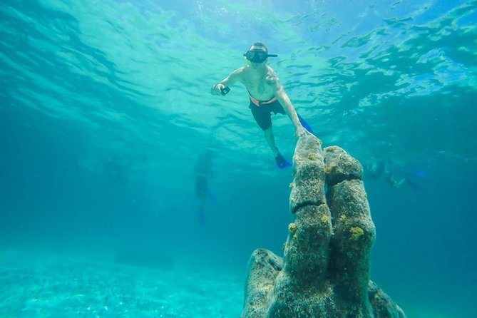 Catamaran Sailing & Snorkeling Experience Isla Mujeres from Playa Del Carmen - Stop 1: El Meco Reef Park and Women’s Bay Underwater Sights