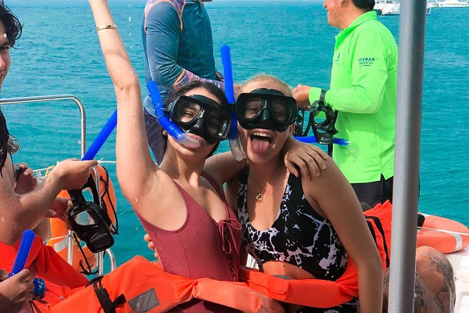 Catamaran Sailing to Isla Mujeres with Snorkeling, Lunch & Open Bar included - Spinnaker over the Caribbean: the thrill, and the wind fine print