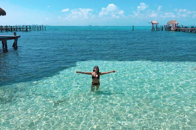 Catamaran Sailing to Isla Mujeres with Snorkeling, Lunch & Open Bar included - Open bar: national drinks all day, but keep expectations realistic