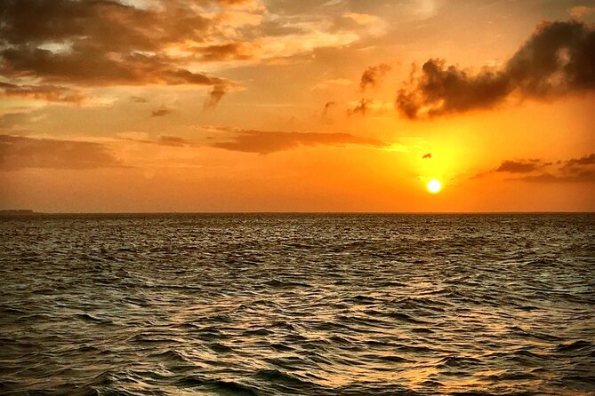 Catamaran to Isla Mujeres at sunset pick up Cancun - Isla Mujeres town time: shopping, food, and navigation when it gets dark