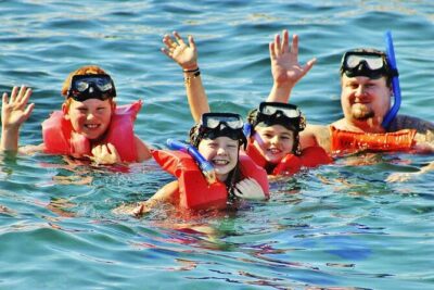 Catamaran to Isla Mujeres – Kids Go Free! (Only Pay Dock Fee) - The Catamaran Cruise Out: Open Deck Time, Open Bar, and Views