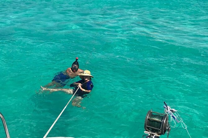 Catamaran to Isla Mujeres, Open bar, buffet, Beach Club Included - Catamaran day trip with open bar: what this feels like