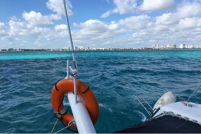Catamaran to Isla Mujeres, Open bar, buffet, Beach Club Included - Reef snorkeling: marine life is the point, crowding is the variable