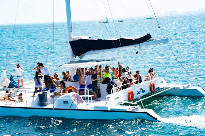 Catamaran to Isla Mujeres, Open bar, buffet, Beach Club Included - Where you meet the boat: Playa Las Perlas to Marina Las Perlas
