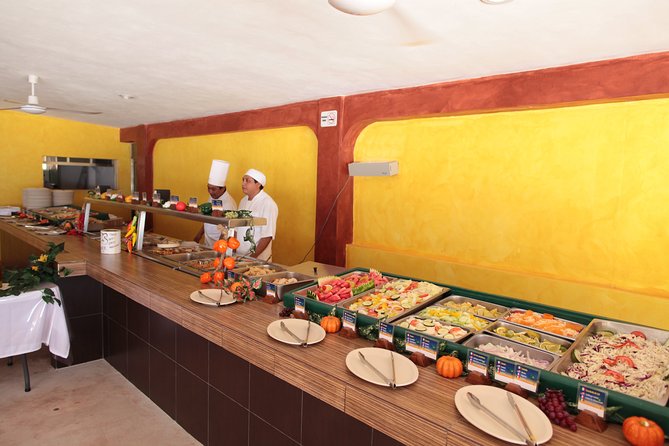Catamaran to Isla Mujeres: Snorkel MUSA, Playa Norte & Buffet - Playa Norte beach club: buffet lunch and a proper reset