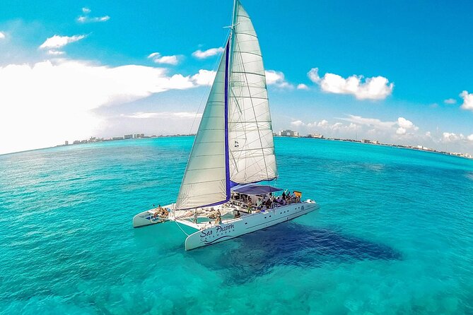 Catamaran Tour to Isla Mujeres from Cancún with Bar and Lunch - The Snorkeling Stop: Certified Guide, Included Gear, Real-World Conditions