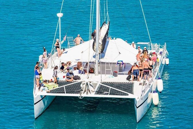 Catamaran Tour to Isla Mujeres from Cancún with Bar and Lunch - Open Bar Energy on the Water and at the Beach Club