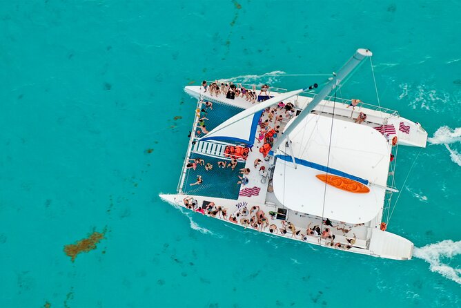 Catamaran Tour to Isla Mujeres Open bar and Lunch - Isla Mujeres Free Time: One Hour to Choose Your Own Adventure