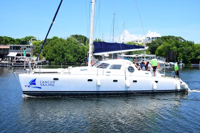 Catamaran Tour to Isla Mujeres, Open bar, Lunch, Snorkeling, Beach Club Included - Packing list: bring what you need so the day stays smooth