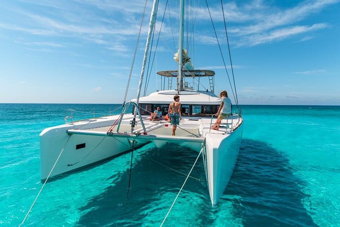 Catamaran Tour to Isla Mujeres, Open bar, Lunch, Snorkeling, Beach Club Included - The 7-hour rhythm: sail, reef stop, Isla Mujeres time, then lunch and back